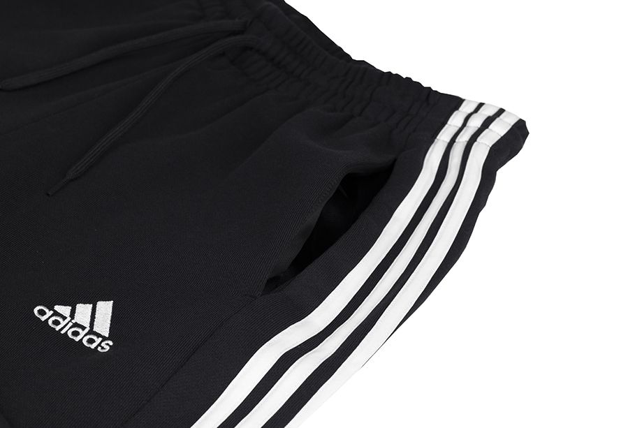 adidas Spodnie męskie Essentials French Terry Tapered Cuff 3-Stripes HA4337