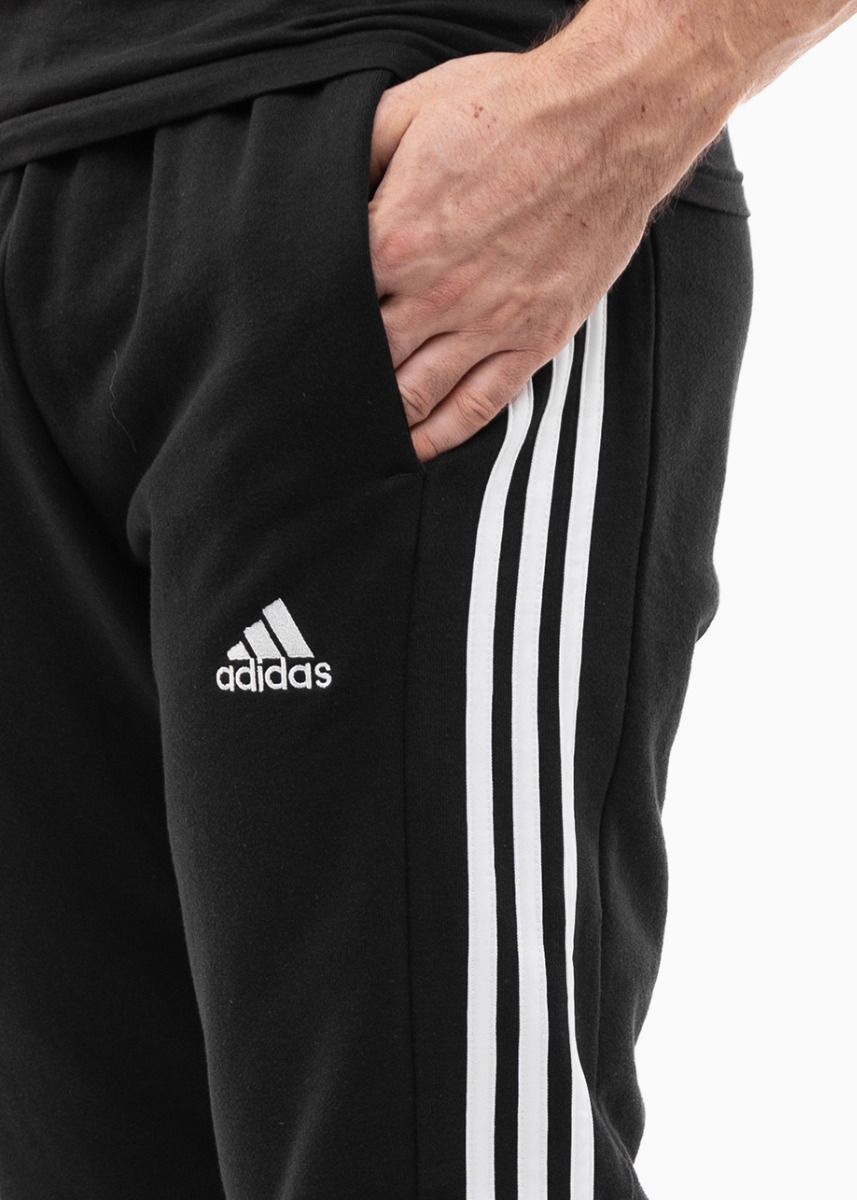 adidas Spodnie męskie Essentials FT Cuff 3-Stripes IC0050