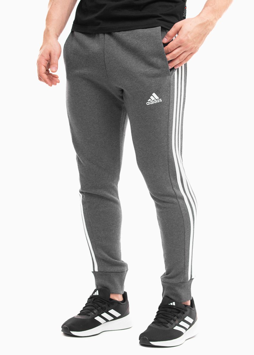 adidas Spodnie męskie Essentials French Terry Tapered Cuff 3-Stripes IC9408