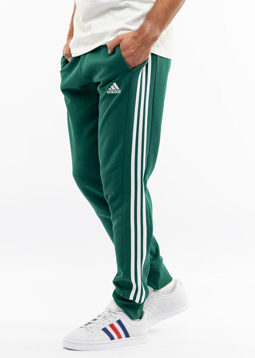 adidas Spodnie męskie Essentials French Terry Tapered Cuff 3-Stripes IS1392