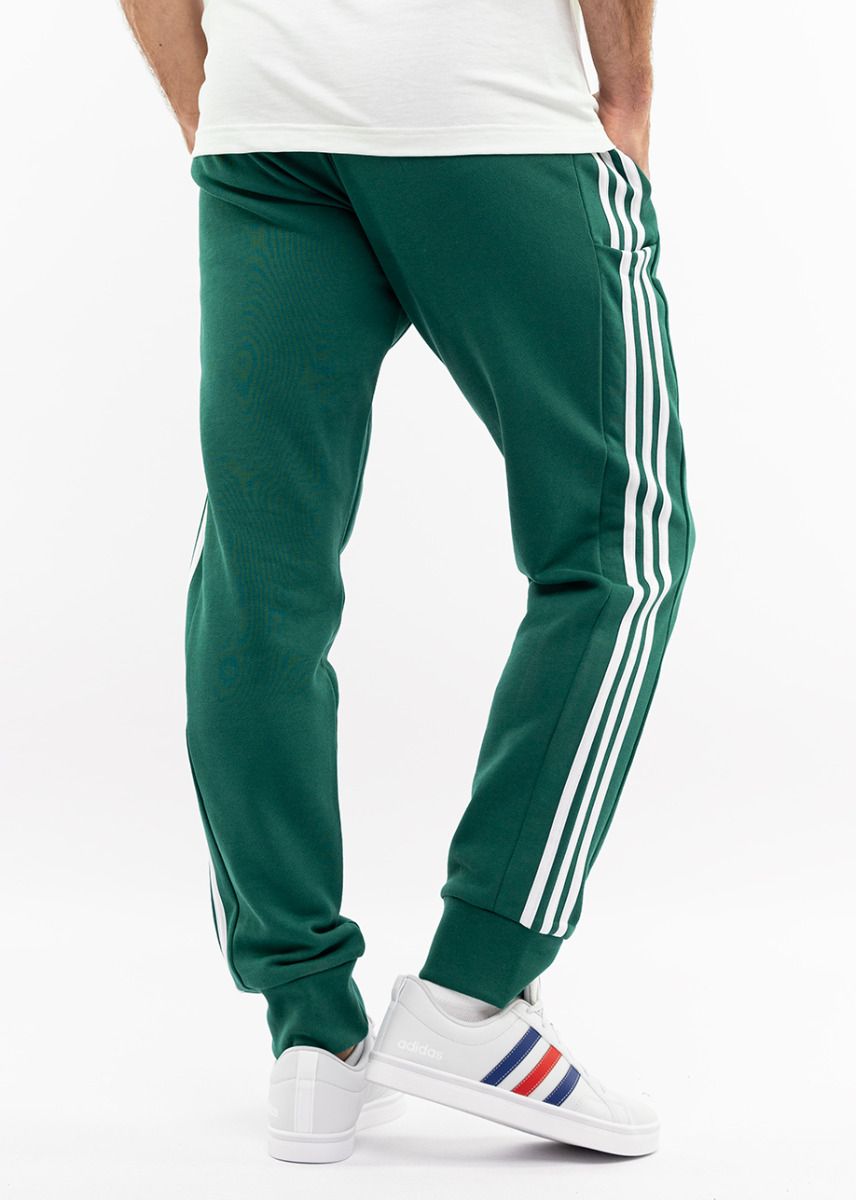 adidas Spodnie męskie Essentials French Terry Tapered Cuff 3-Stripes IS1392