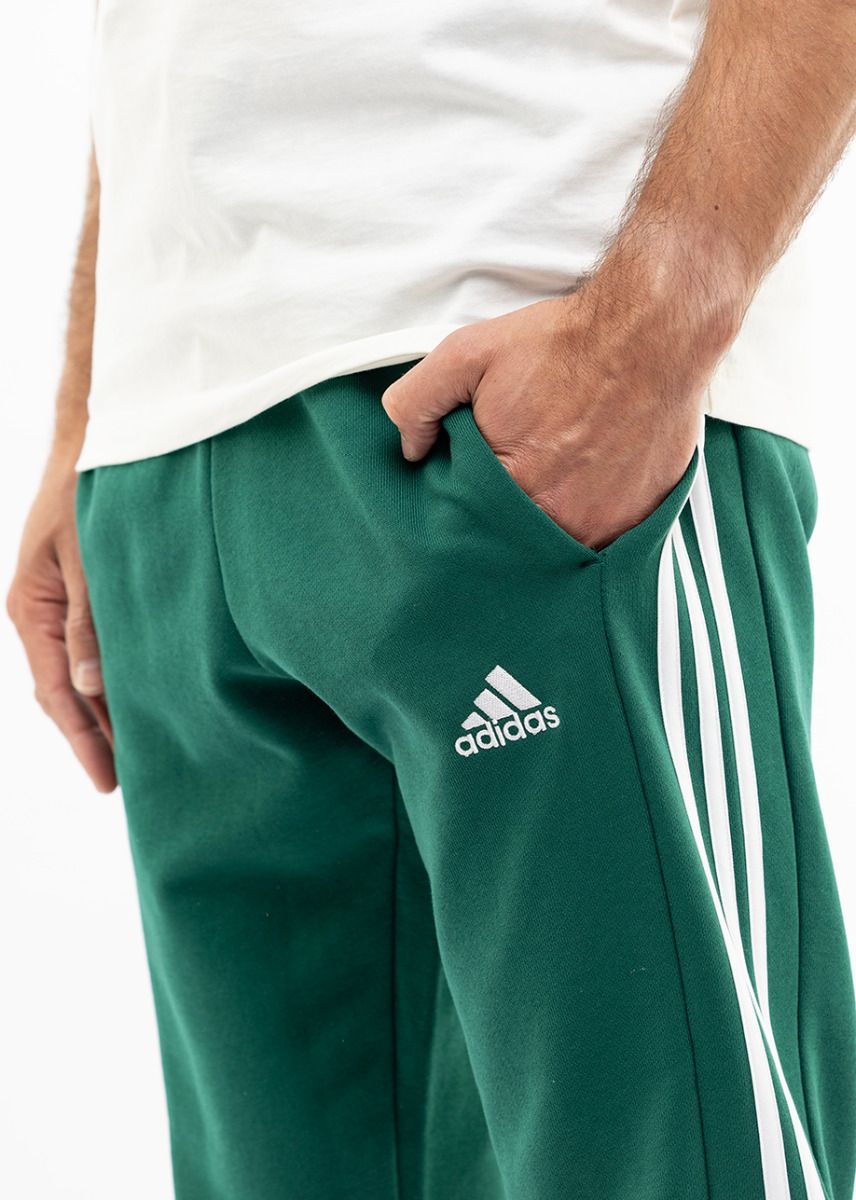 adidas Spodnie męskie Essentials French Terry Tapered Cuff 3-Stripes IS1392