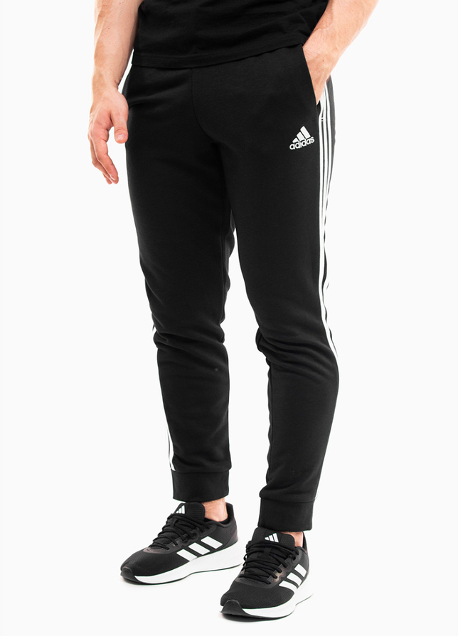 adidas Spodnie męskie Essentials Tapered Cuff 3 Stripes GK8831 adidas Spodnie męskie Essentials Tapered Cuff 3 Stripes GK8831