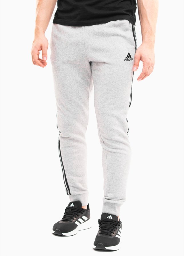 adidas Spodnie męskie Essentials Tapered Cuff 3 Stripes GK8889 adidas Spodnie męskie Essentials Tapered Cuff 3 Stripes GK8889
